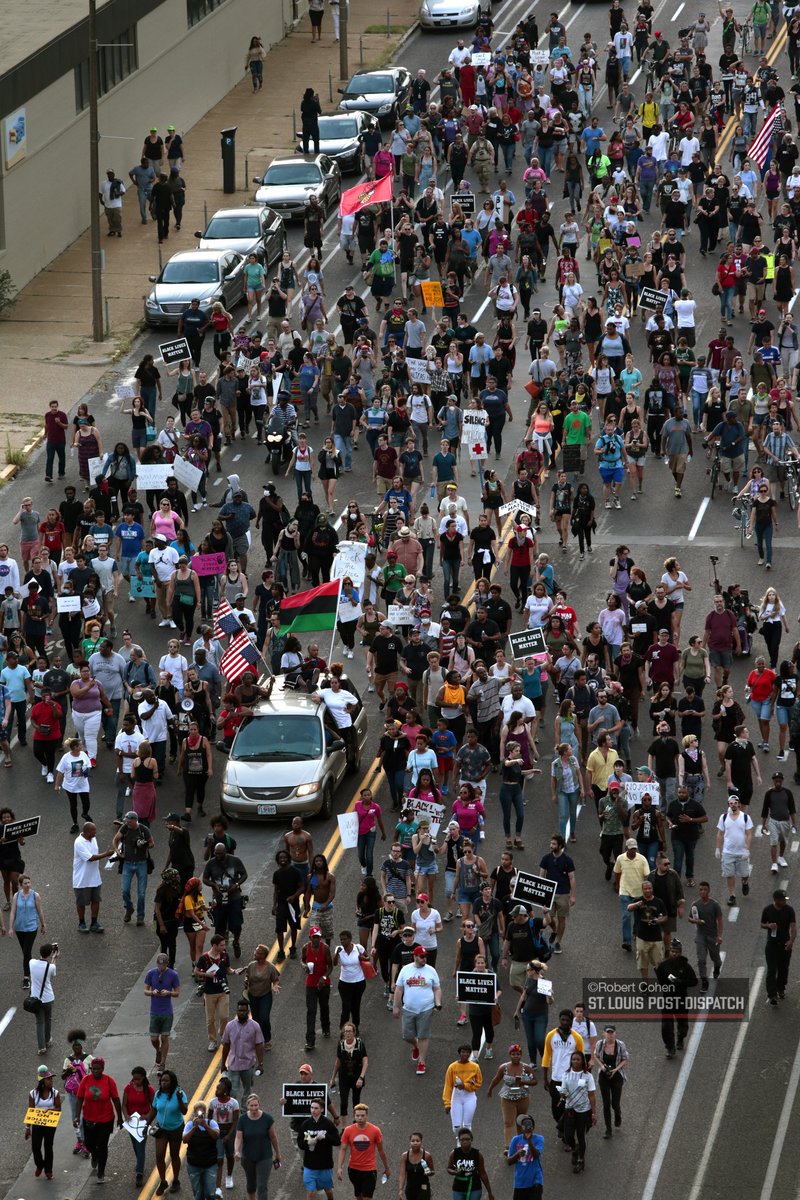 Elevated views of marchers headed toward @SLMPD headquarters. #STLVerdict   