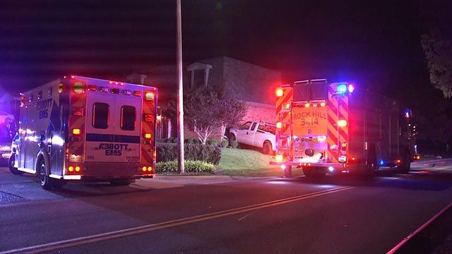 A driver ran off after a truck crashed into the side of a house in Rock Hill early Tuesday morning