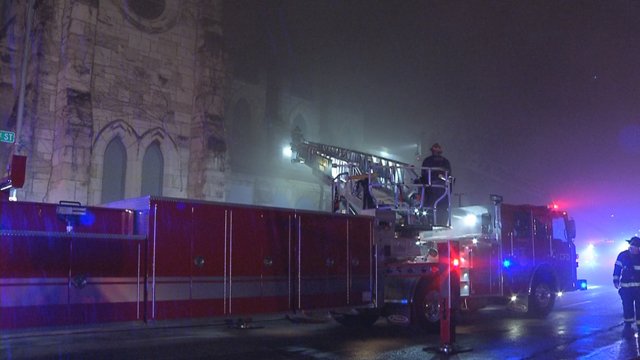 Flames tore through a historic church in east Kansas City late Sunday night and have caused parts of the building's roof to collapse.