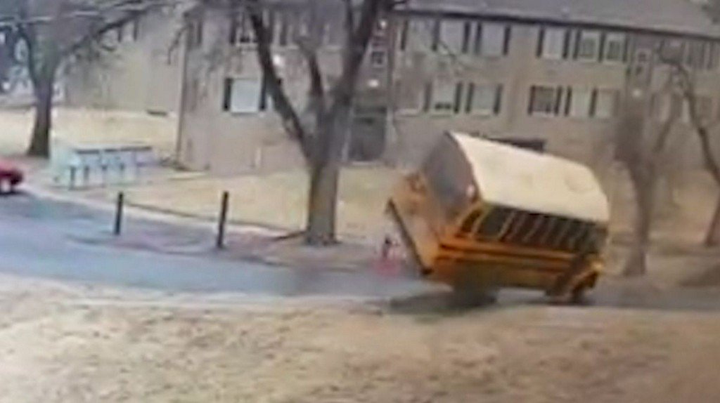 School bus overturns with 3 students on board, including one in wheelchair    