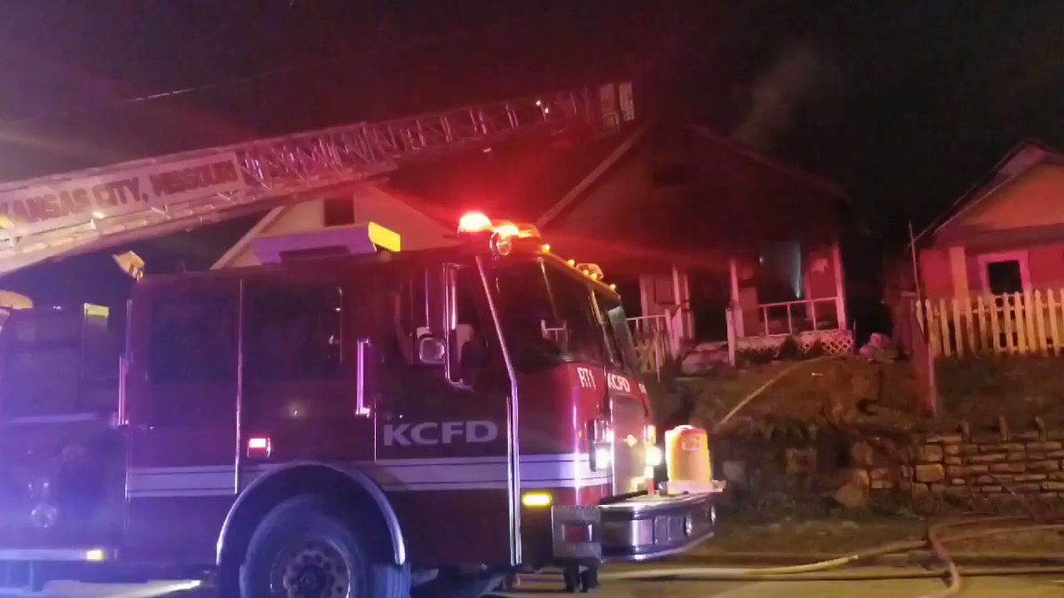 House fire near E. 15th Terrace and Winchester - no injuries reported. Fire crews have been focused on the roof of the home fire spread to part of a home next door too   