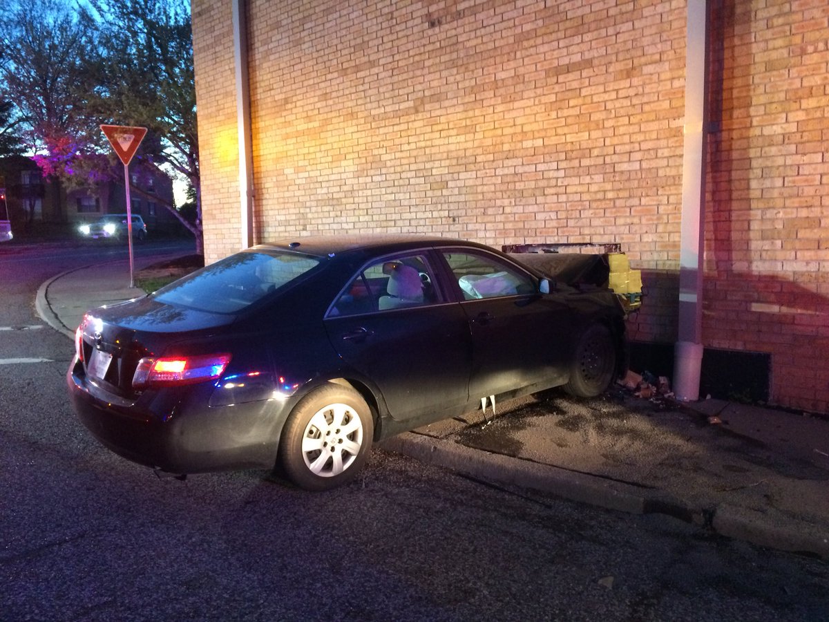 Tow truck on the scene in North County where a driver crashed a car into the back wall of the Schnucks on Bellefontaine just north of I-270. Two of three northbound lanes of Bellefontaine blocked