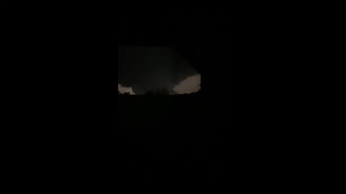 A couple hours later, a large tornado hammered the town of Jefferson City, Missouri. This video shows lightning illuminating what appears to be a massive wedge tornado