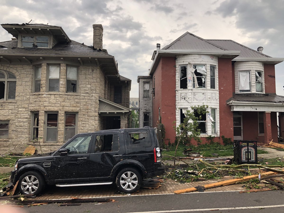 Funeral home recently renovated on the left. All the cars look like this