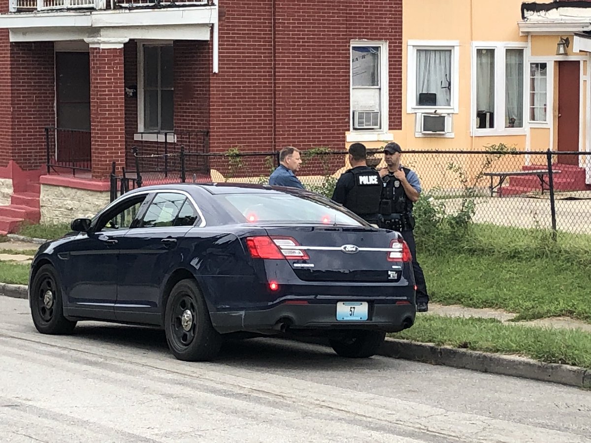 Kcpolice working a big scene near Independence and Indiana.  Chief Rick Smith says officers discharged a weapon.  Smith says preliminary info shows no officers injured. A police SUV looks T-Boned, here, as well. A minivan is also on street with door open.