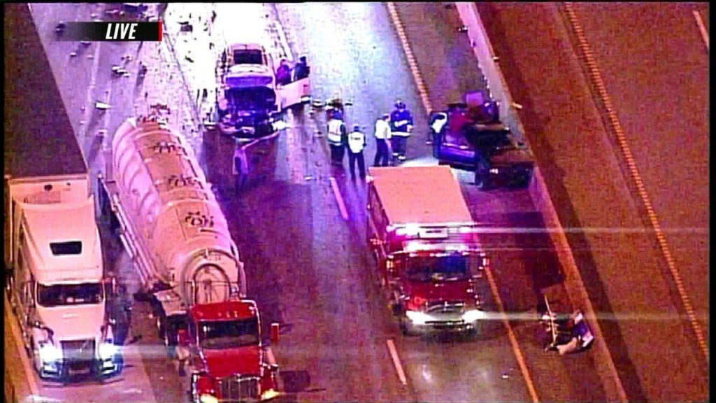 Lane closures, debris on WB 1-70 after car collides with tractor-trailer