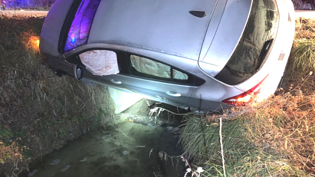 First responders stopped a vehicle from tipping over and rescued a person from inside in Winfield