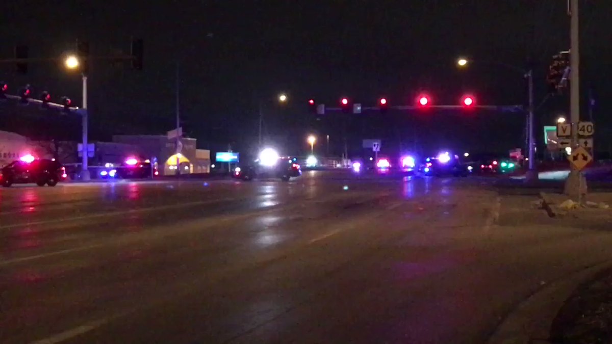 Police on scene of a shooting at a nightclub on Highway 40 off South Noland Road.