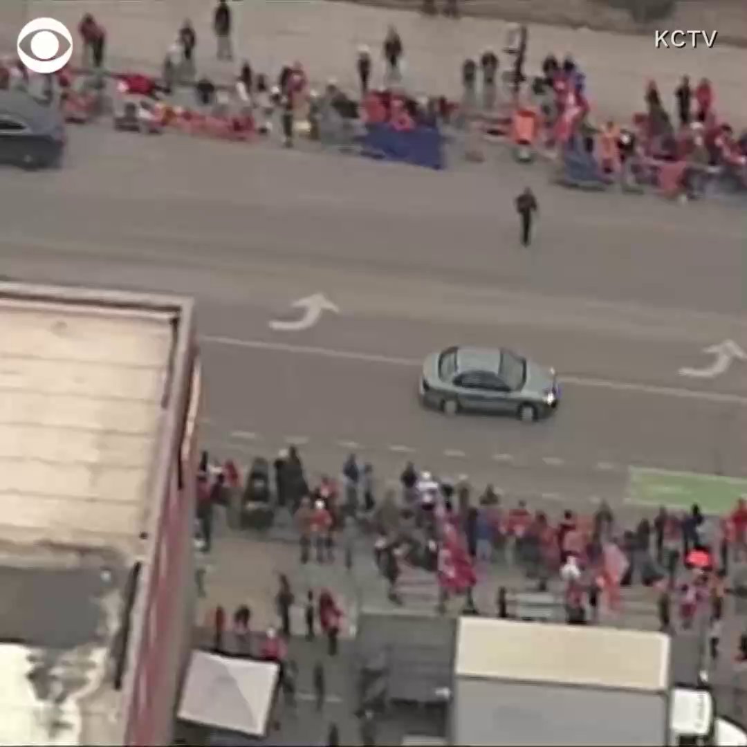 Police chase ends in a crash with authorities surrounding the vehicle along the parade route celebrating the Kansas City Chiefs's Super Bowl win