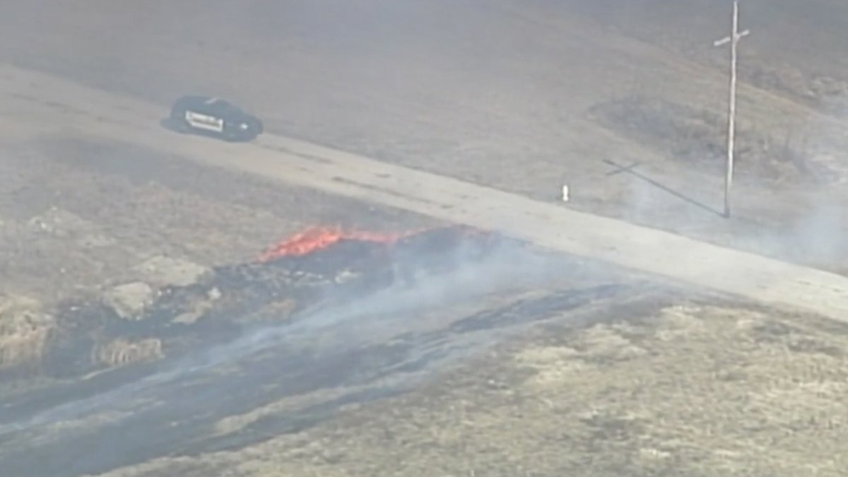 Crews are battling flames at a commercial building in Riverside, Missouri, as the metro remains under an increased fire risk due to high winds and low humidity near the building in the 5200 block of Northwest 41st Street