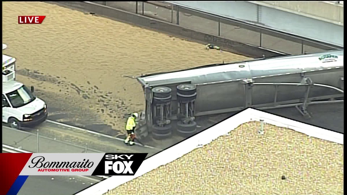 Scene of this overturned tractor trailer that has 64/40 EB closed down.. traffic being forced off at Vandeventer 