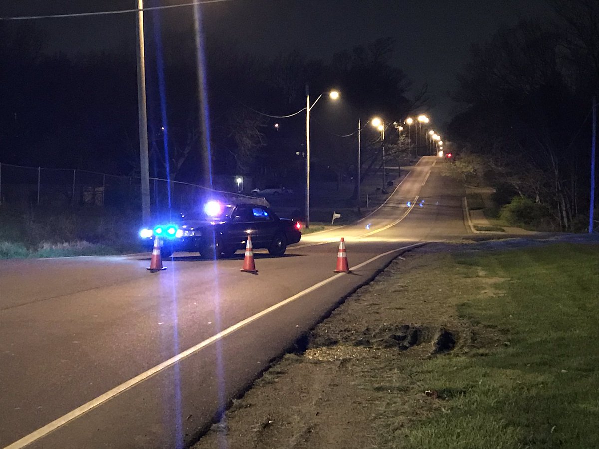 Kcpolice are in a standoff with people inside a house on Sni-a-Bar Rd. Police say some of the people inside have guns and they were originally called to the house for an armed robbery. 