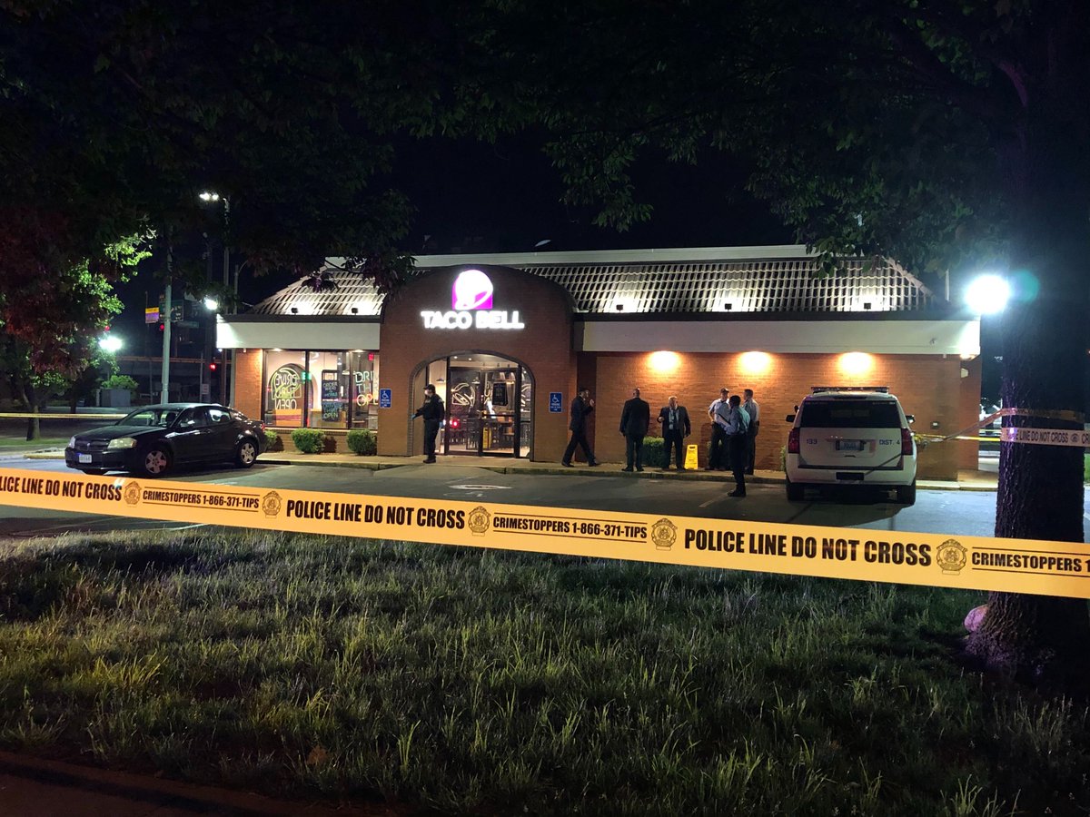 Police investigating after a man was found dead in the parking lot of Taco Bell