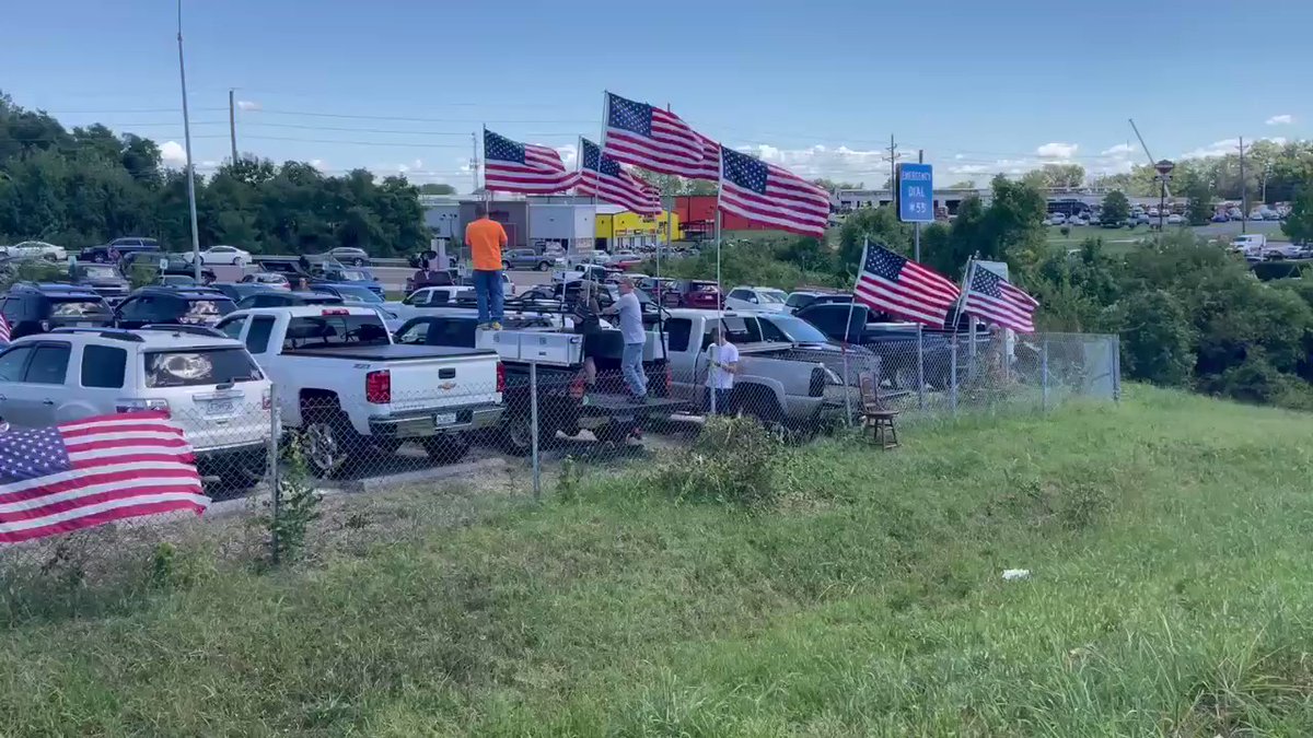 This is the scene at Cave Springs Rd. as people lineup to pay their respect to LCpl. 