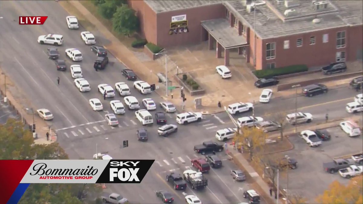 Massive police presence at Cleveland School at the intersection of Arsenal and Kingshighway in St. Louis.  Three people injured