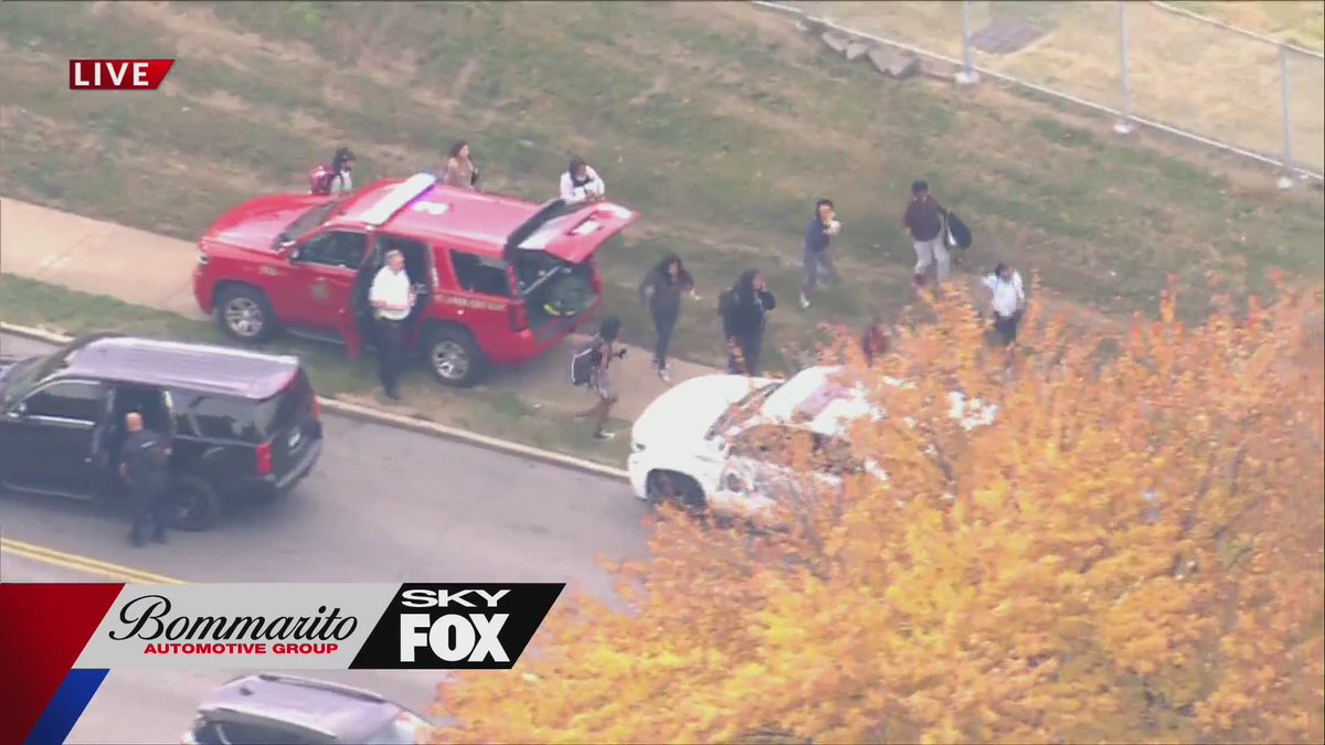 Massive police presence at Cleveland School at the intersection of Arsenal and Kingshighway in St. Louis.  Three people injured