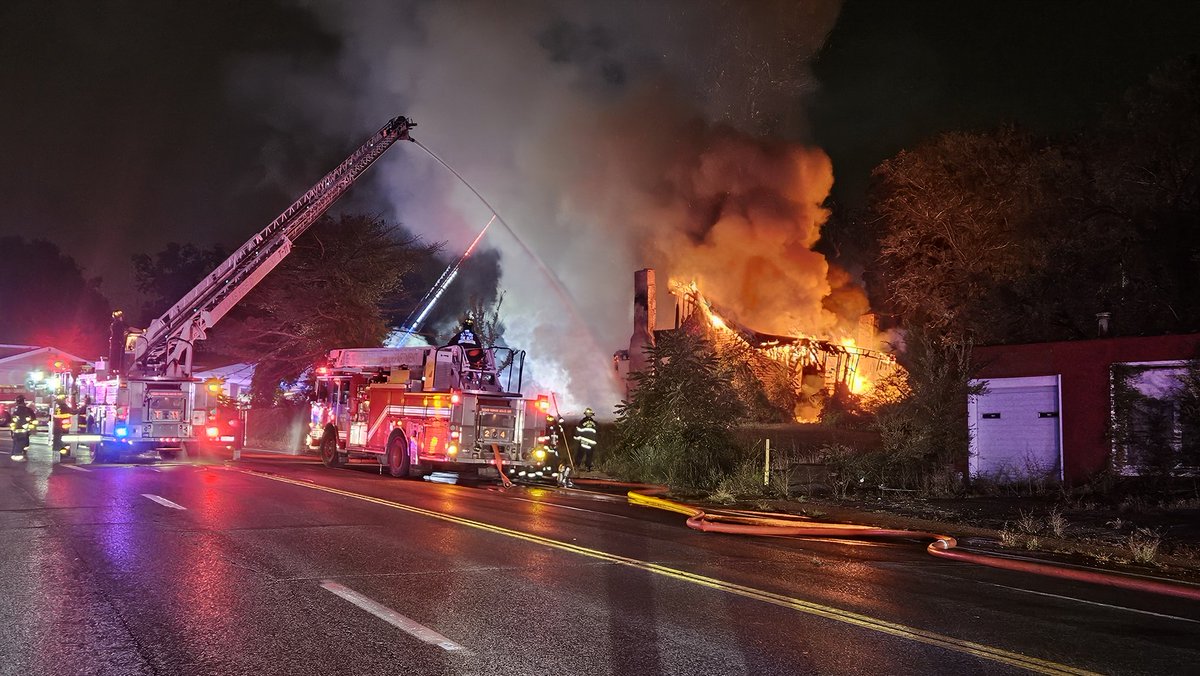 Several fire departments on the scene of a First Alarm fire in Pine Lawn. House believed to be vacant. No injuries reported