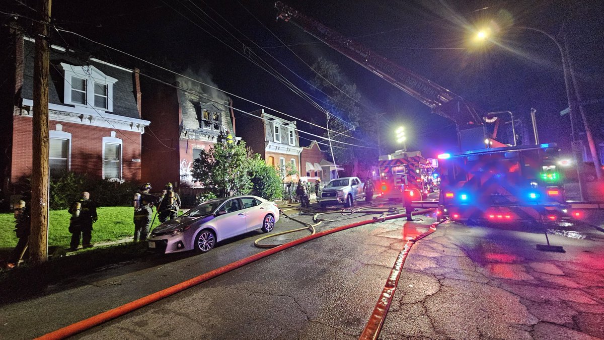St. Louis firefighters on the scene of a first alarm fire in the 1900 block of President St. Two men transported in critical condition. Cause under investigation